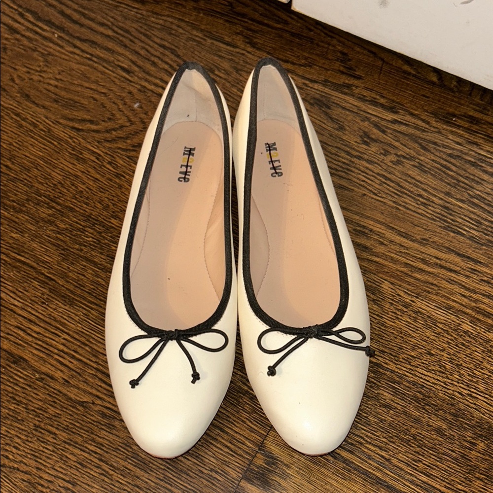 Maeve Cream Flats with Black Bow Accent
